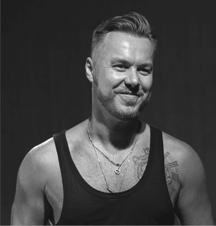 Man with good strong body build in black and white